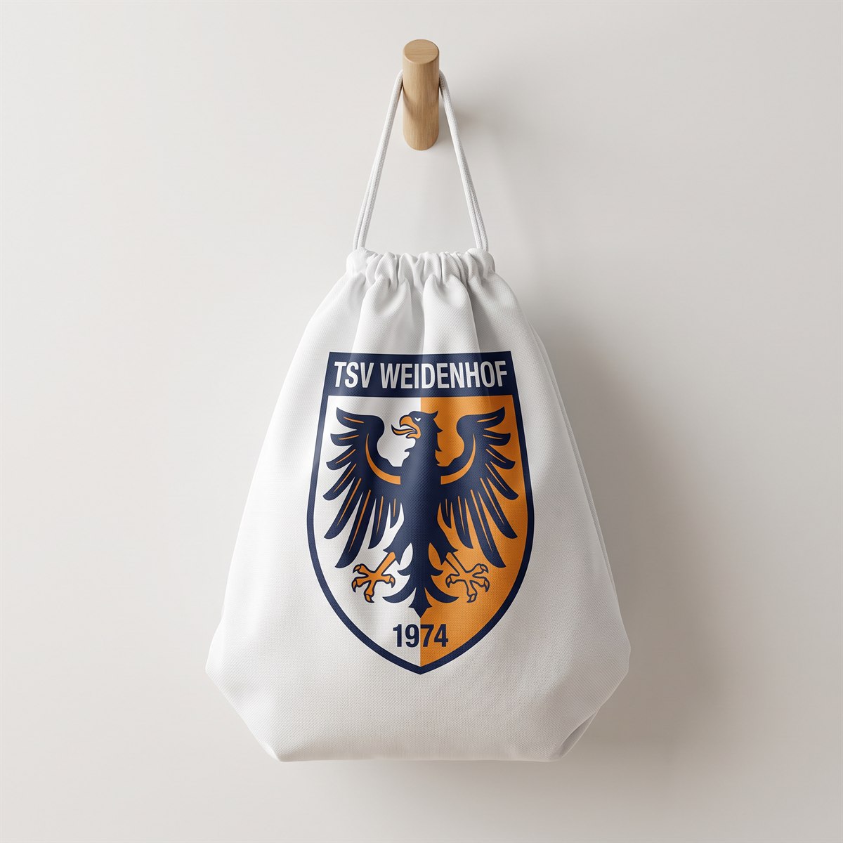 White drawstring bag with sublimation print, club crest on the front