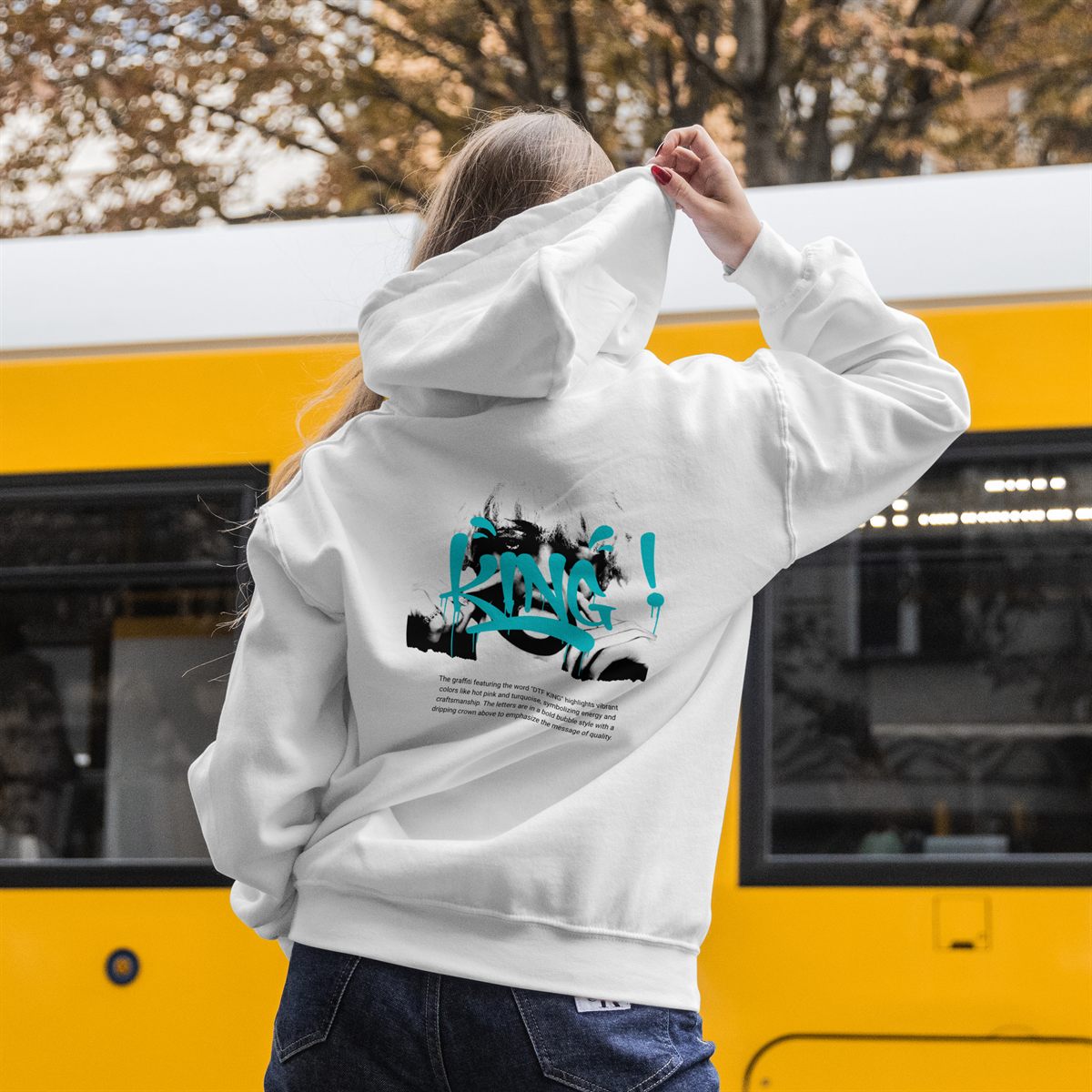 White jacket with a DTF back print, turquoise graffiti design across the entire back