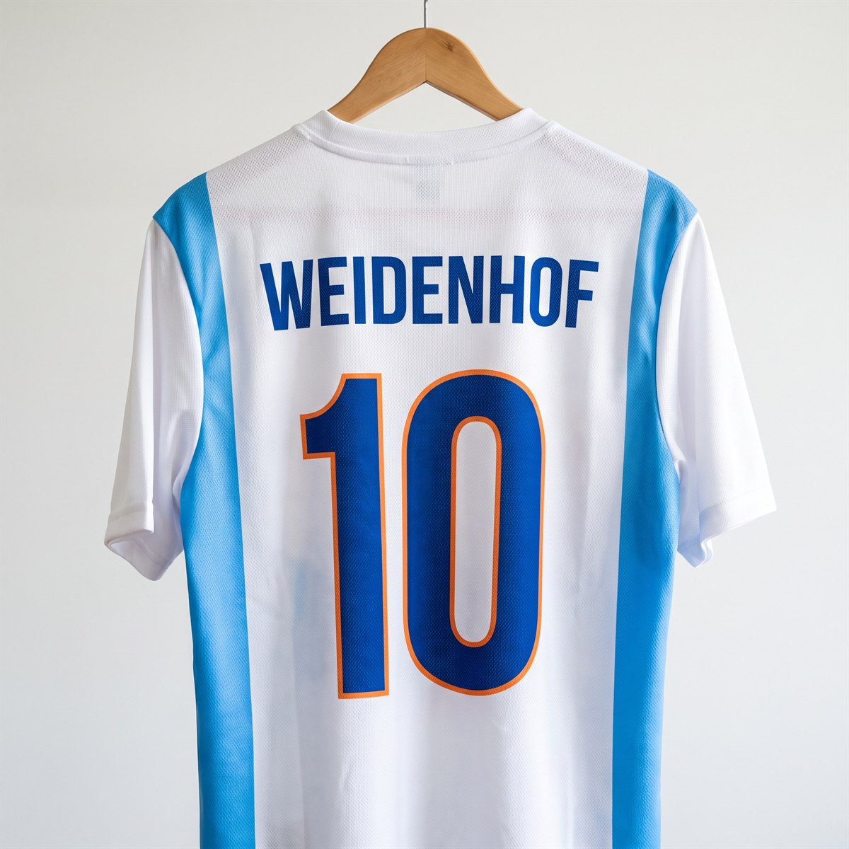 Sports jersey with sublimation print, back number and club name